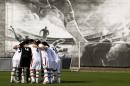 Iran's national soccer team players huddle before the start of an international soccer friendly against Trinidad and Tobago at the Corinthians soccer team training center Sao Paulo, Brazil, on Sunday, June 8, 2014. Iran will play in group F of the 2014 soccer World Cup. (AP Photo/Julio Cortez)