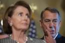 Speaker of the House John Boehner stands behind House Minority Leader Nancy Pelosi during a press conference on Capitol Hill in Washington, DC, September 30, 2014