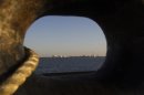 A general view of an oil dock is seen from a ship at the port of Kalantari in the city of Chabahar