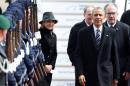 U.S. President Obama is welcomed after his arrival at Hanover airport
