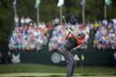 Rory McIlroy, of Northern Ireland, hits his tee shot on the eighth hole during the first round of the PGA Championship golf tournament at Valhalla Golf Club on Thursday, Aug. 7, 2014, in Louisville, Ky. (AP Photo/David J. Phillip)