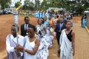 The Rwandan genocide flame is escorted by residents upon arrival at the Kicukiro Grounds as the country prepares to commemorate the 1994 Genocide in the Rwandan capital