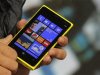 A Nokia executive shows the new Lumia 920 phone with Microsoft's Windows 8 operating system at a launch event in New York