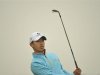Guan of China watches his shot during the Championship Pro-Am of the Volvo China Open at Binhai Lake Golf Club in Tianjin municipality
