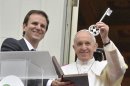 Pope Francis receives the symbolic key to the city from Rio de Janeiro Mayor Eduardo Paes