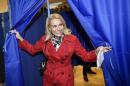 Thorning-Schmidt casts her vote during general elections, in Oesterbro