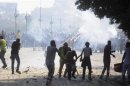 Flares are fired as members of Muslim Brotherhood and supporters of ousted President Mursi clash with anti-Mursi protesters in Cairo
