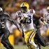 LSU running back Jeremy Hill (33) carries for a 50-yard touchdown as South Carolina cornerback Jimmy Legree (15) pursues during the second half of an NCAA college football game in Baton Rouge, La., Saturday, Oct. 13, 2012. LSU won 23-21. (AP Photo/Gerald Herbert)