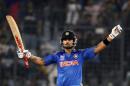 India's Virat Kohli celebrates after India won the semi final match against South Africa in the ICC Twenty20 World Cup in Dhaka