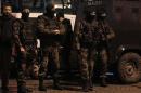 Special forces police officers stand guard at the scene of a bomb blast in Istanbul