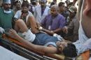 An injured Indian CRPF personnel is taken to a hospital at Raipur
