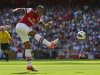 Arsenal's Walcott shoots during their English Premier League soccer match against Sunderland in London