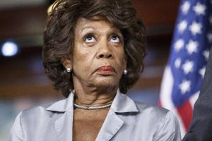 Rep. Maxine Waters, D-Calif., listens to comments by …