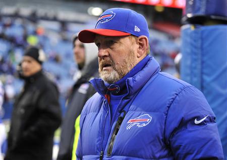 Buffalo Bills head coach Chan Gailey leaves the field after beating the New York Jets at their NFL football game in Orchard Park, New York in this file photo taken December 30, 2012. REUTERS/Doug Benz/Files