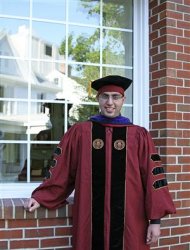 Jose Godinez-Samperio, 26, is shown in his Florida State University graduation gown in Tallahassee, Florida, in this May 2011 handout photo. Godinez-Samperio came to the country illegally as a child and is hoping that the Florida Supreme Court will create a precedent by clearing his way for admission to the Florida bar. REUTERS/Maria Elena Godinez-Samperio/Handout