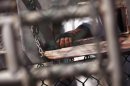 A Guantanamo Bay detainee waits for lunch inside the detention center on Sept. 16, 2010.