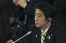 Japanese Prime Minister Abe attends the first working session of the G20 Summit in Constantine Palace in Strelna near St. Petersburg