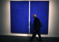 A visitor walks past Barnett Newman's 'Onement VI,' dated 1953 and estimated between $30 - 40 million, during a preview of Sotheby's May 14 Contemporary Art Evening Auction at Sotheby's in New York, May 3, 2013. REUTERS/Mike Segar