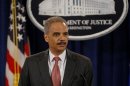 U.S. Attorney General Eric Holder announces enforcement actions against UBS Securities Japan Co. Ltd.investment bank at the Justice Department in Washington