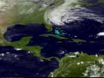 In this image taken by NOAA's GOES East on Sunday, Oct. 28, 2012, Hurricane Sandy is seen on the East Coast of the United States.  Sandy weakened briefly to a tropical storm Saturday but was soon back up to Category 1 strength, packing 75 mph winds. It was about 260 miles (420 kilometers) south-southeast of Cape Hatteras, N.C., and moving northeast at 13 mph as of 5 a.m. Sunday, according to the National Hurricane Center in Miami. The storm was expected to continue moving parallel to the Southeast coast most of the day and approach the coast of the mid-Atlantic states by Monday night, before reaching southern New England later in the week. (AP Photo/NOAA)