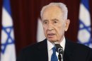 Israel's President Peres speaks during a news conference in Riga