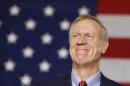 Bruce Rauner smiles after winning the midterm elections in Chicago, Illinois