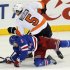 New York Rangers' Stralman dives to stop a shot by Philadelphia Flyers' Coburn in the third period of their NHL hockey game at Madison Square Garden in New York