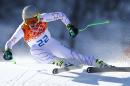 United States' Ted Ligety makes a turn in the downhill portion of the men's supercombined at the Sochi 2014 Winter Olympics, Friday, Feb. 14, 2014, in Krasnaya Polyana, Russia. (AP Photo/Alessandro Trovati)