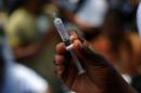 Researchers hope trials for an Ebola vaccine could finish by the end of 2014