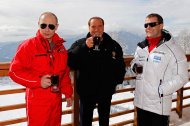 File- In this Thursday, March 8, 2012 file
   photo,
 then Russian Prime Minister Vladimir Putin, left, former Italian Prime Minister Silvio Berlusconi,
 center, and then Russian President Dmitry Medvedev, right, smile during their meeting in the mountain resort of Krasnaya Polyana near the Black Sea resort of Sochi, southern Russia. A court in Italy has convicted former Premier Silvio Berlusconi of tax fraud and sentenced him to four-years in prison. Berlusconi is expected to appeal. (AP Photo/RIA-Novosti, Dmitry Astakhov, Presidential Press Service)