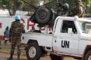 U.N. peacekeepers take a break as they patrol along a street during the presidential election in Bangui CAR