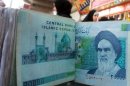 The US has imposed new economic sanctions on a pair of Chinese and Iraqi banks accused of doing business with Tehran
