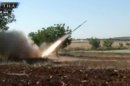 This image from amateur video obtained by a group which calls itself Ugarit News, which is consistent with AP reporting, shows a rocket fired by Syrian rebels in Qusair, Syria, Tuesday, May 28, 2013. Europe's decision to allow member states to arm Syrian rebels and Russia's renewed pledge to send advanced missiles to the Syria regime could spur an arms race in an already brutal civil war and increasingly turn it into a East-West proxy fight. Britain promises not to transfer any arms before diplomacy is given a chance in Syria peace talks expected next month, while a top rebel commander says he needs Western anti-aircraft and anti-tank missiles now to prevent more regime gains on the battlefield. (AP Photo/Ugarit News via AP video)