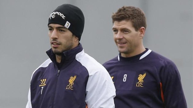 Luis Suarez (left) and Steven Gerrard (Reuters)
