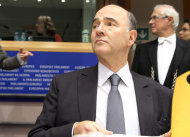 <p>               French Finance Minister Pierre Moscovici looks up, during a hearing of the Committee on Economic and Monetary Affairs, at the European Parliament in Brussels, Monday, Dec. 3, 2012. Details of a plan for Greece to reduce its heavy debt by buying some of it back at bargain prices will be presented Monday to finance ministers from the 17 European Union countries that use the euro. (AP Photo/Yves Logghe)