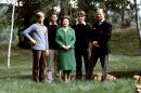 Queen Elizabeth and the Duke of Edinburgh (R) pose with their three sons and the royal corgies, November 20, 1979