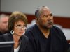 Defense attorney Patricia Palm, left, and O.J. Simpson appear at an evidentiary hearing in Clark County District Court on May 17, 2013 in Las Vegas. Simpson, who is currently serving a nine-to-33-year sentence in state prison as a result of his October 2008 conviction for armed robbery and kidnapping charges, is using a writ of habeas corpus to seek a new trial, claiming he had such bad representation that his conviction should be reversed.  (AP Photo/Ethan Miller, Pool)