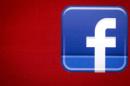 FILE PHOTO - A Facebook logo is displayed on the side of a tour bus in New York's financial district