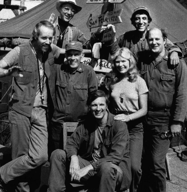 FILE - In this Jan. 24, 1882 photo provided by CBS, the cast members of M*A*S*H* , from left: Mike Farrell, Bill Christopher, Harry Morgan, Alda, Loretta Swit, Jamie Farr and David Ogden Stiers.   The
