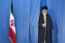 FILE PHOTO: Supreme Leader Ayatollah Ali Khamenei arrives to cast his ballot in Iran's Parliamentary election in Tehran