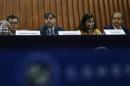 Members of the Inter-American Human Rights Commission (CIDH) attend a news conference in Mexico City