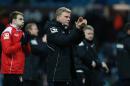 Bournemouth's English manager Eddie Howe applauds after the final whistle in the FA Cup fourth round football match in Birmingham, England on January 25, 2015