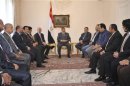 The Muslim Brotherhood's President-elect Mohamed Mursi meets with Egyptian political leaders and activists at the presidential palace in Cairo