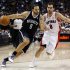 Nets Williams drives to the net past Raptors Calderon during their NBA basketball game in Toronto