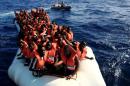 An overcrowded dinghy with migrants from different African countries is followed by members of the German NGO Jugend Rettet as they approach the Iuventa vessel during a rescue operation in the Mediterranean Sea