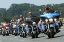Riders take part in the Rolling Thunder First Amendment Demonstration motorcycle run on Memorial Day by crossing the Memorial Bridge leading from Arlington Cemetery into Washington