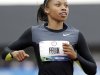 Allyson Felix finishes her heat in the women's 200 meters at the U.S. Olympic Track and Field Trials Thursday, June 28, 2012, in Eugene, Ore. (AP Photo/Eric Gay)