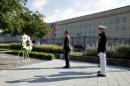U.S. President Barack Obama, Defense Secretary Ash Carter and Joint Chiefs Chair Gen. Joseph Dunford take part in a ceremony marking the 15th anniversary of the 9/11 attacks at the Pentagon in Washington