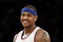 FILE - In this Feb. 1, 2015 file photo, New York Knicks' Carmelo Anthony smiles during the second half of the NBA basketball game against the Los Angeles Lakers, in New York. The NBA star announced Thursday, June 11, 2015, that he is bringing a professional soccer team to Puerto Rico for the first time in three years. (AP Photo/Seth Wenig, File)