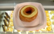 A cronut, the brainchild of French pastry chef Dominique Ansel, on a plate at Ansel's bakery shop in New York on June 14, 2013. Ansel is regarded as one of the most talented pastry chefs in New York